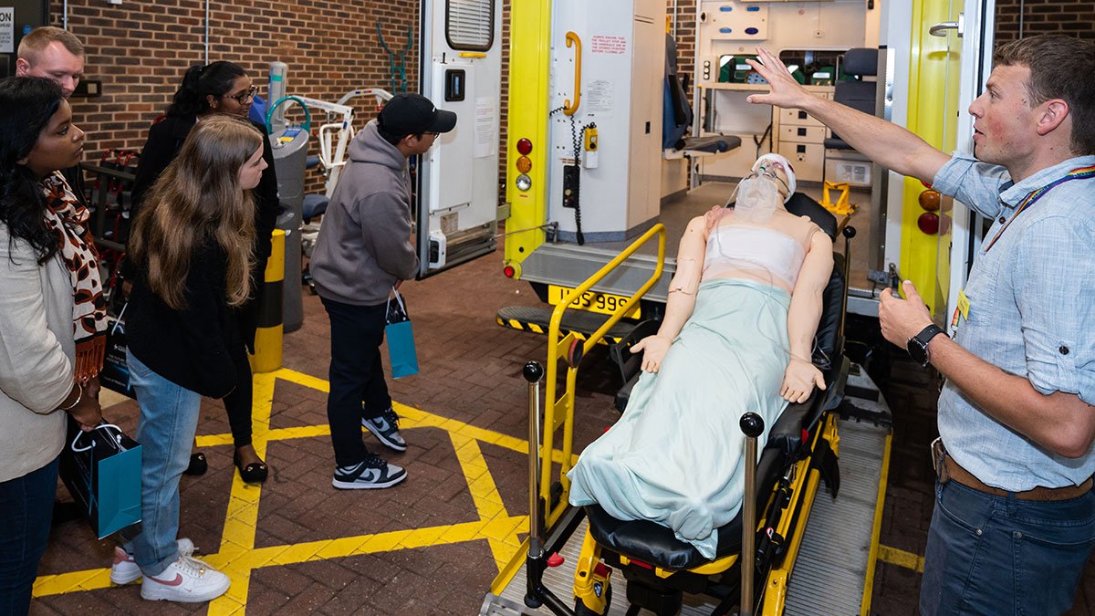 People watching ambulance bay demonstration on open day