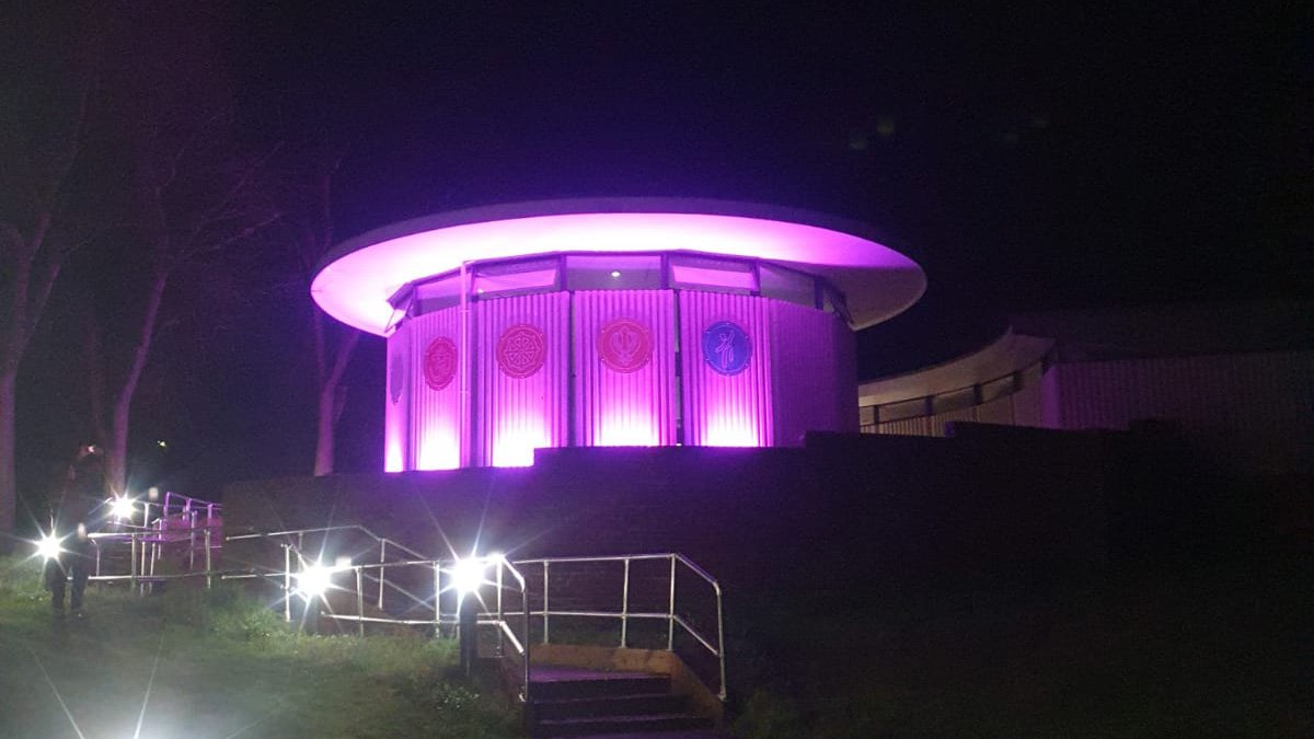 Chaplaincy Centre lit up in purple