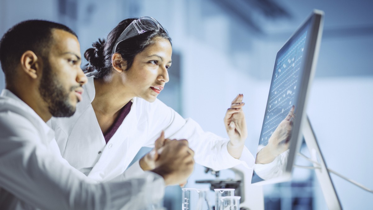 scientists-look-at-computer-GETTY