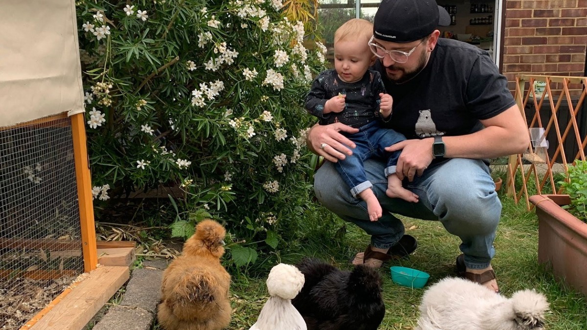 Rob Siddall and son with chickens