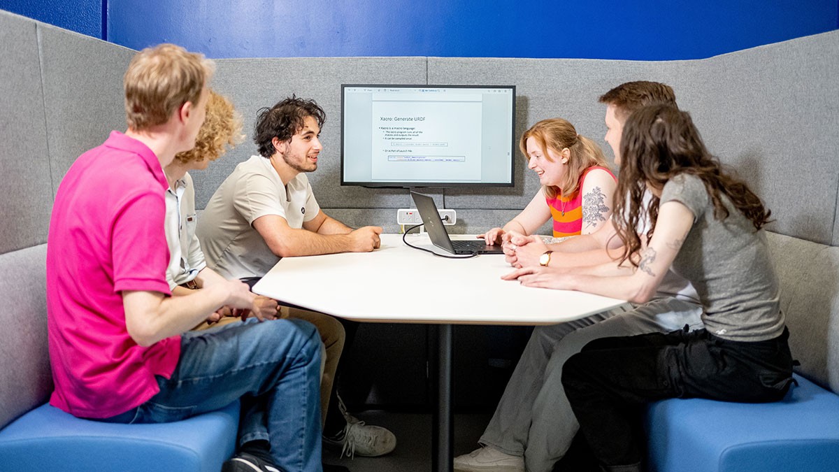 Students in collaboration booth