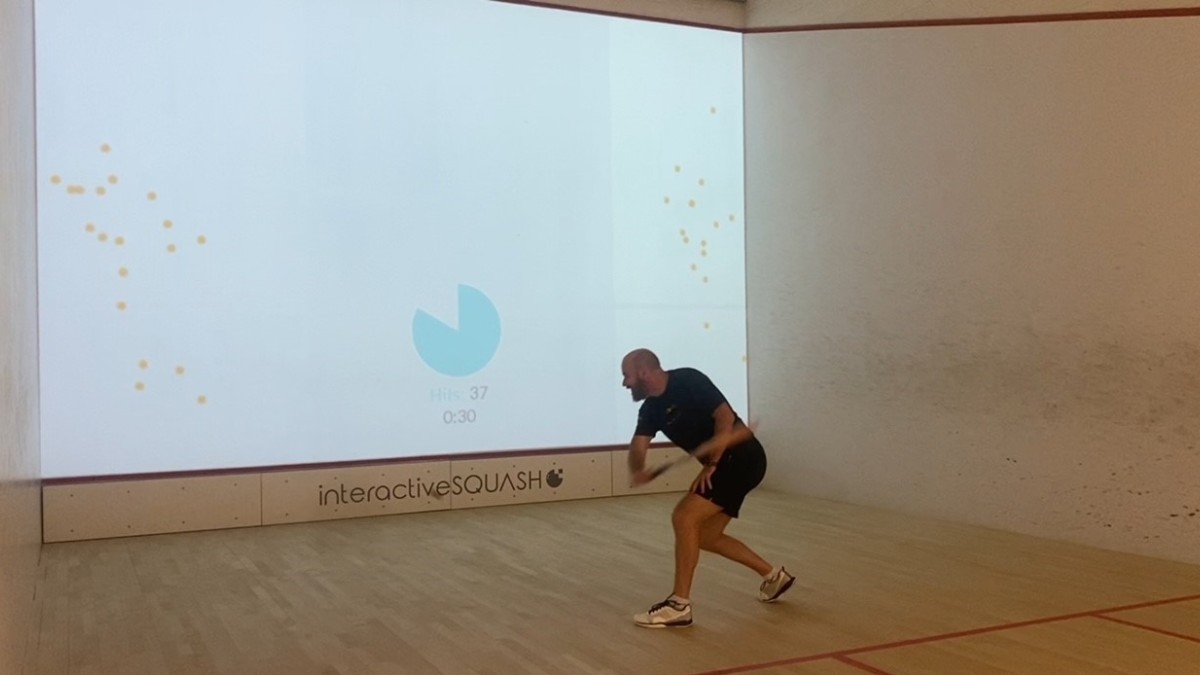 Director of Squash, Jesse Engelbrecht, demonstrates how the wall works