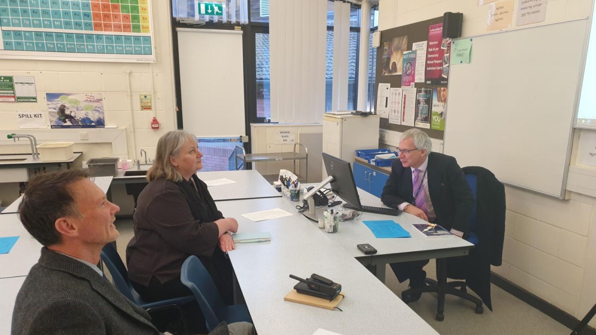 Two teachers from Alton College learn from Surrey Space Centre's Prof Clive Underwood in one of their classrooms