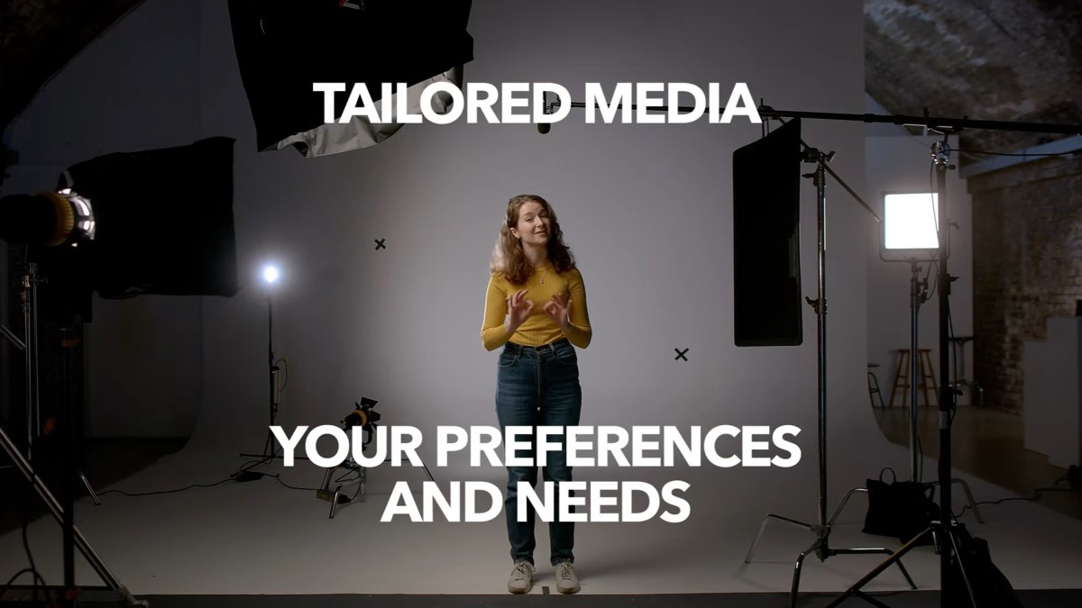 Woman standing in film studio. Text: tailored media - your preferences and needs
