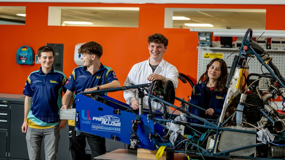 Formula Student Society stood with their car
