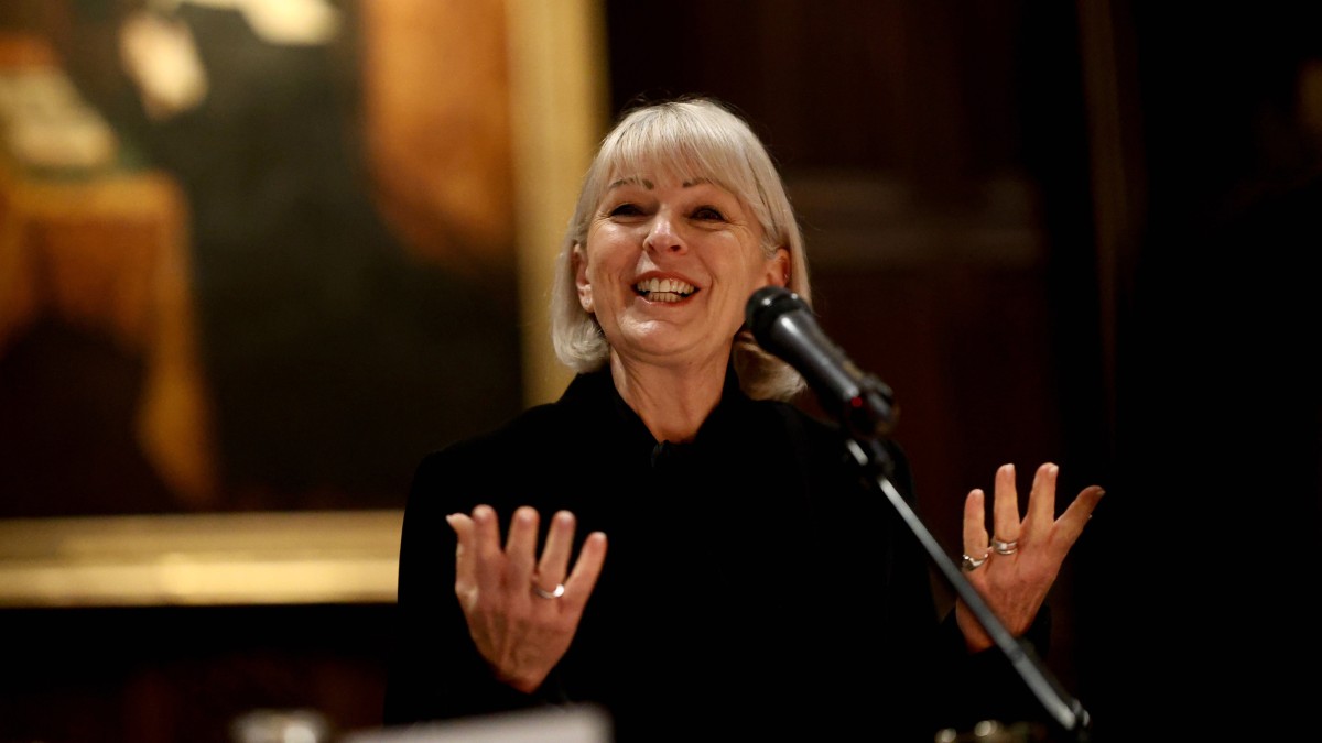 Judith speaking at an event