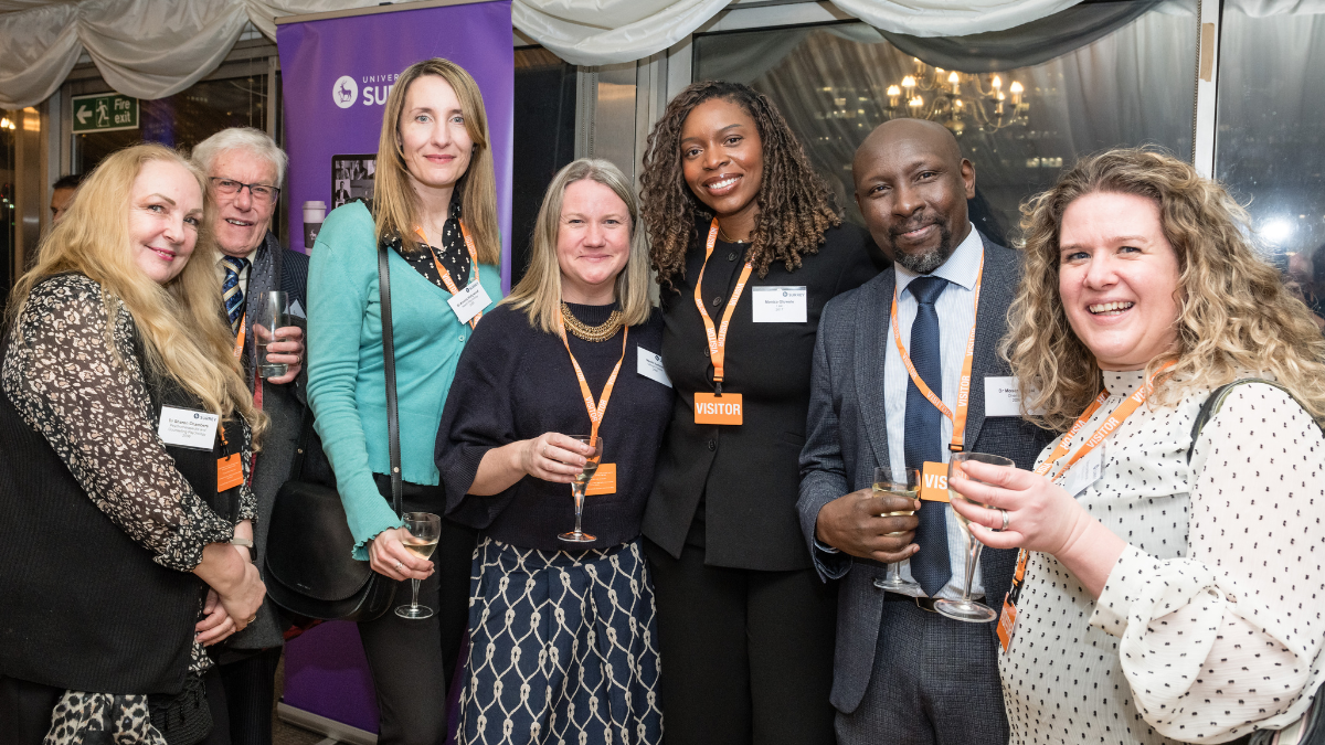 A photograph of members of our Alumni community