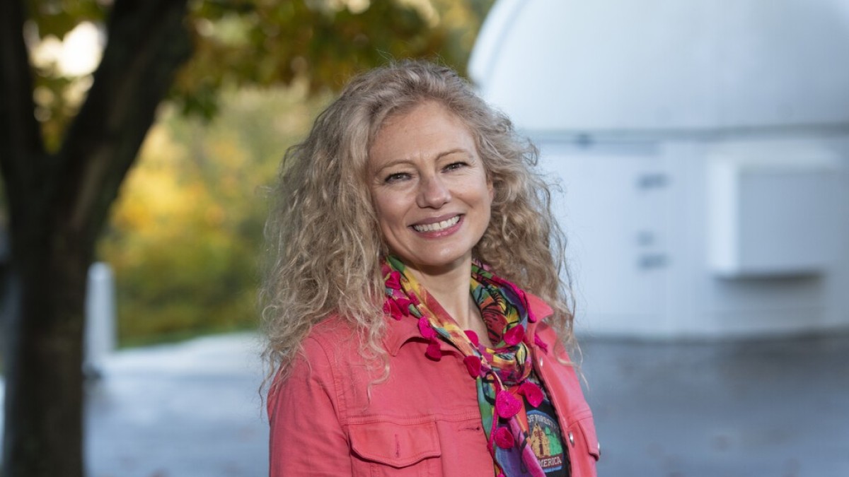 Dr Noelia Noel near a space observatory