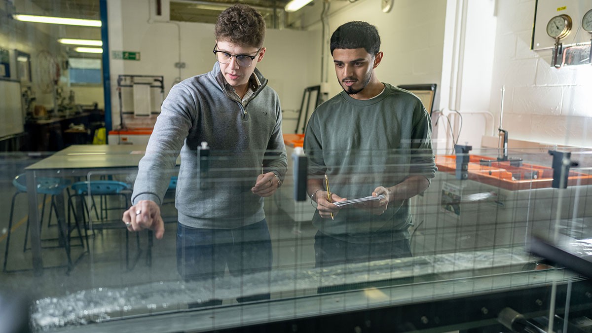 Civil engineering students in hydraulics lab
