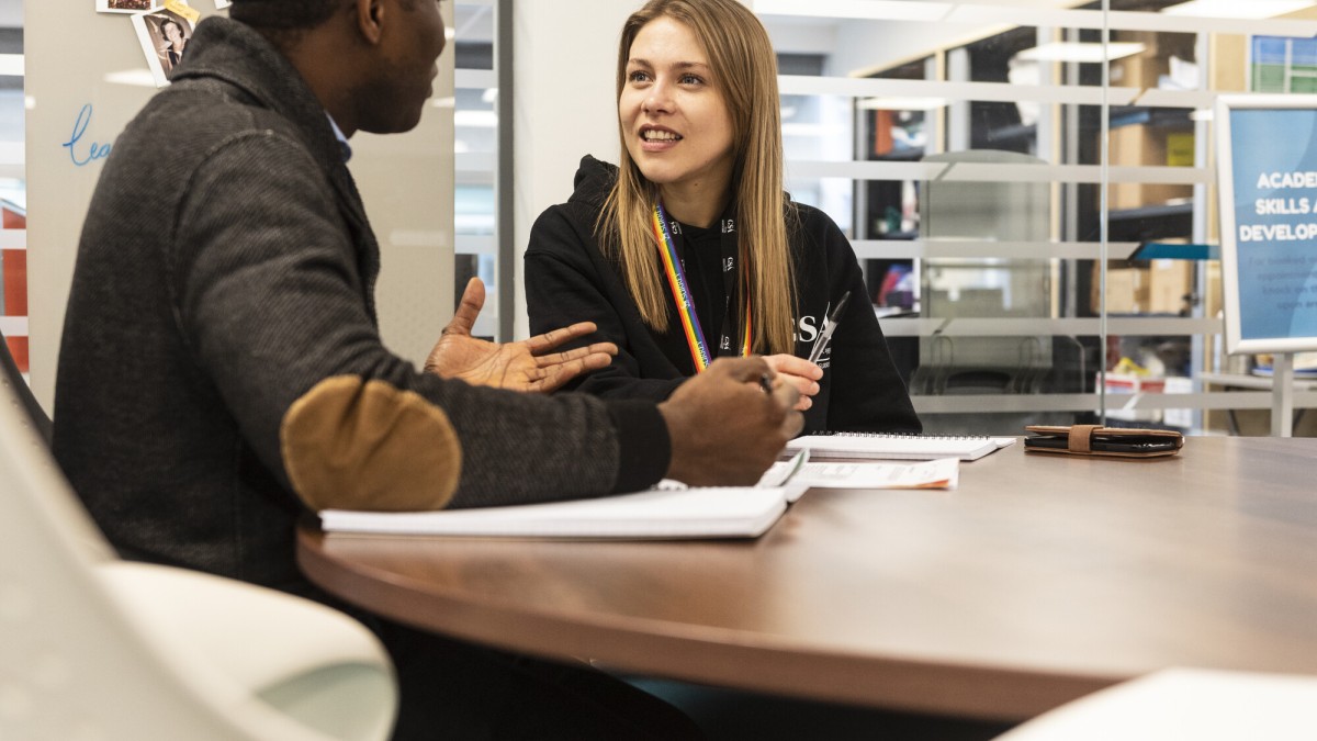 Students studying in library