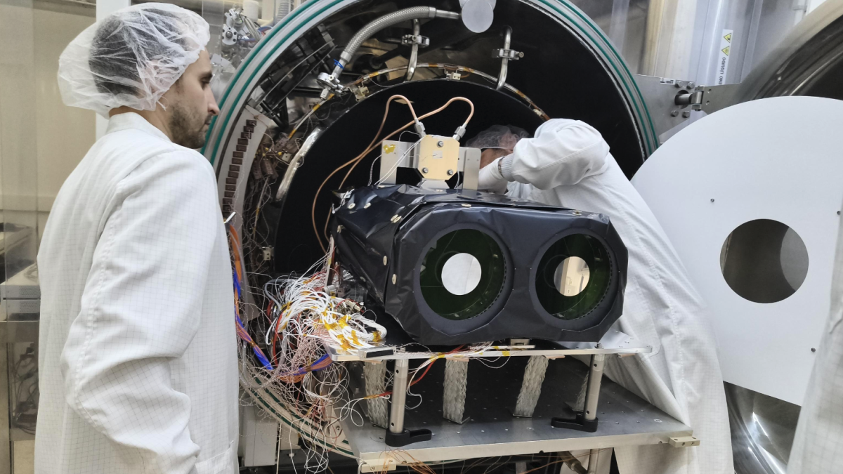 Members of the ARRAKIHS instrument team working on the scientific payload
