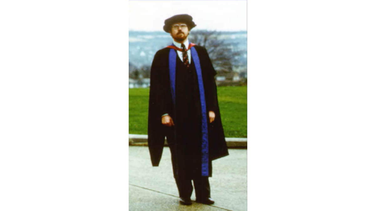 A photograph of Dr Ebsworth at his PhD graduation in 1980