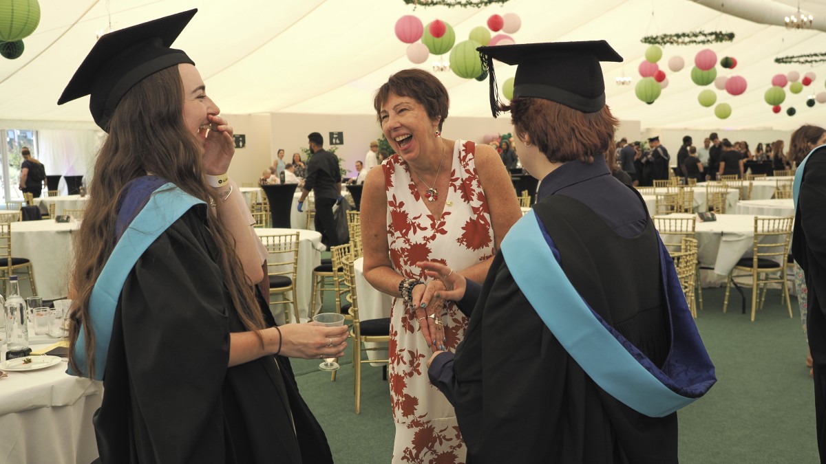 Dr Nicky Fox chats to prize winners Maisy Willett and Alice Willoughby