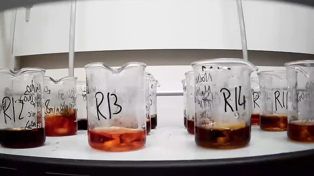 Beakers with different colour liquids for testing