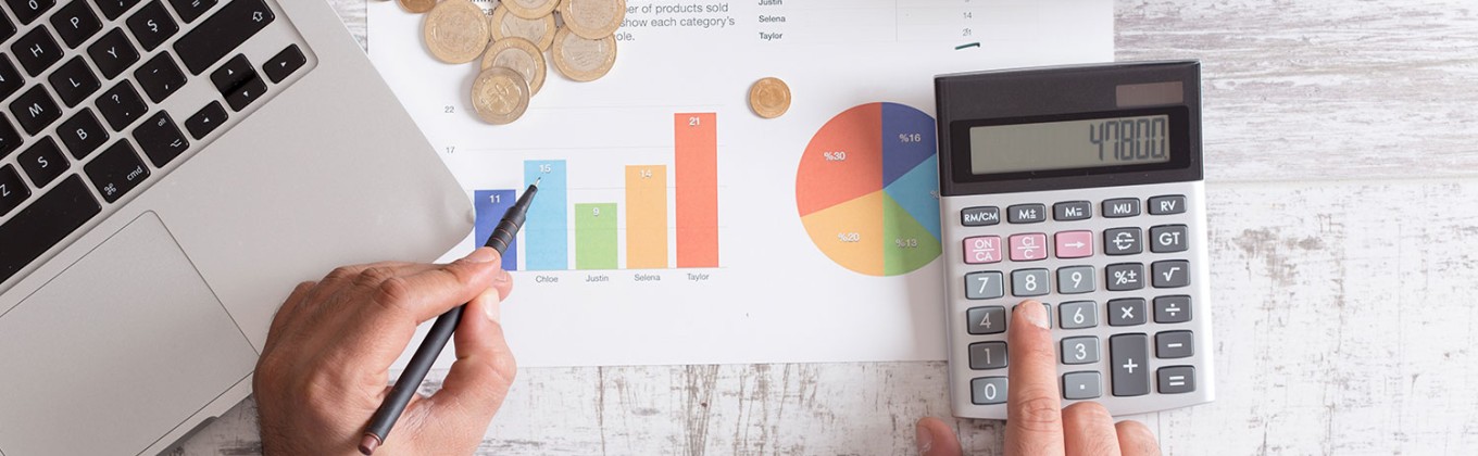 Graphs and calculator being read