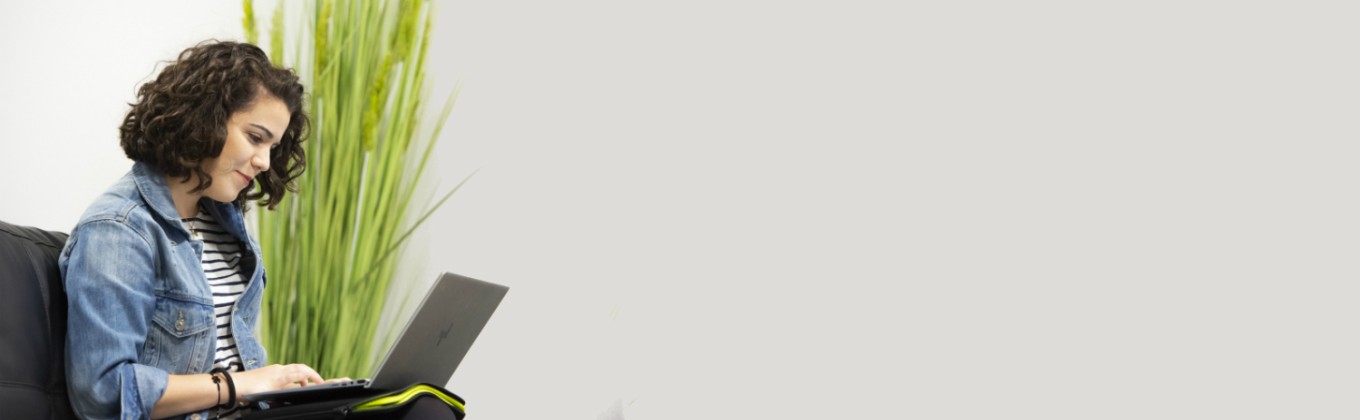 Female student working on her laptop